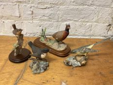 A group of four Border Fine Arts bird sculptures including pheasant on wooden base, some losses