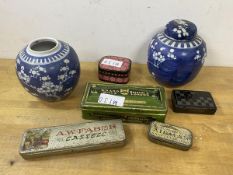 A mixed lot including three vintage tins, two lacquered boxes and two ginger jars, one lacking