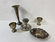 A mixed lot of silver including two egg cups, one pierced dish combined weight 98 grammes, also a