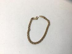 A fancy link chain bracelet marked 9k, measures 17cm, weighs 1.8 grammes