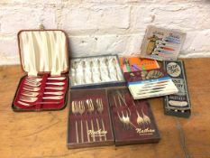 A quantity of cutlery including pastry forks, coffee spoons, little forks, table knives (a lot)