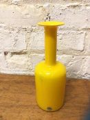 A Kastrup Holmegaard cased glass vase of bottle form with label, measures 27cm high