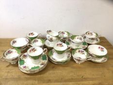 A Paragon part tea set in Rockingham pattern, includes milk jug which measures 10cm high, six