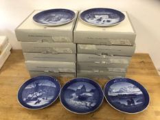A collection of Royal Copenhagen Christmas plates covering dates from the 1960's to 1990's, some