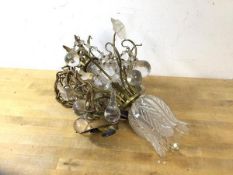 A gilt metal and glass ceiling light with tulip style pendant shade below multiple arms with bulbous