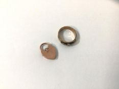 A padlock style locket marked 9k along with a ring marked 9k with seed pearls, size P, combined