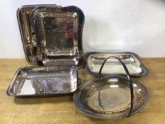 Four Epns serving dishes, measure approximately 27cm x 22cm and one swing handle pierced basket (5)