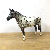 A Beswick china Appalachia horse, measures 20cm high