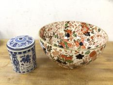 A Dutch blue and white sugar lidded canister, inscribed to base Heinneken Delft Holland, (12cm h)