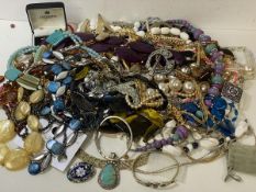 A large quantity of costume jewellery including necklaces, bangles, cufflinks etc, also a