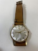A Tissot gentleman's wrist watch marked 375 to interior, inscribed verso D Plant 1979, on tan