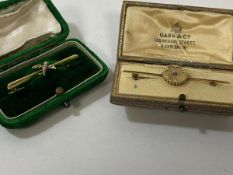 A gold bar brooch with bird having five seed pearls (4cm) weighs 1.26 grammes, a yellow metal bar