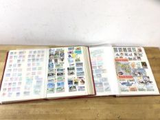 Two albums and Guernsey and Jersey stamps, well filled stock books, Jersey less so Guernsey, nice