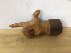 John Butler, hand carved anatomical wall hanging of finger pointing, label verso