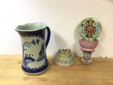 A Chinese Buddhist alter ornament with red seal mark a/f and a blue and white Chinese water jug with