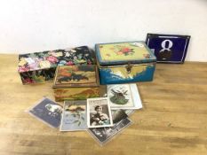 A mixed lot including vintage tins, (largest 11cm x 25cm x 19cm), an enamel house number sign,