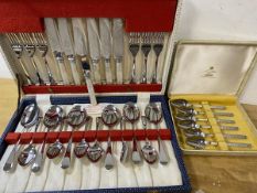 A 1970's boxed set of Viners grapefruit spoons, inscribed Studio, with textured handles (14cm), a