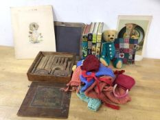A mixed lot of children's toys and books including a Barringer Bear, a collection of dolls knitwear,