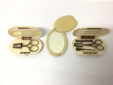 Two 19th century ivory cased etui cases and cased mirror