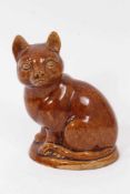 A lead glazed stoneware model of a cat, circa 1820