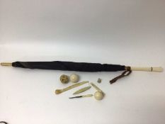 Quantity of ivory and bone, including two ivory billiard balls, a Chinese puzzle ball, umbrella, etc
