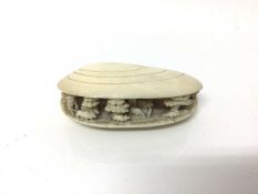 19th century Japanese ivory clam shell diorama, the inside with figures, livestock, trees and buildi