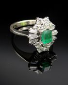 18CT WHITE GOLD EMERALD & DIAMOND CLUSTER RING, the central emerald (5 x 4mms approx.) surrounded by