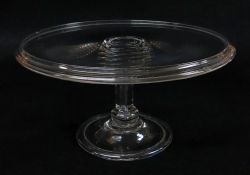 GEORGIAN GLASS TAZZA, c. 1750-1800, with raised rim, on a hollow baluster column, folded foot, 23.6