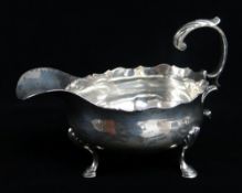 GEORGE II SILVER SAUCE BOAT, maker I*M, London 1769, cut card rim, flying scroll handle and three
