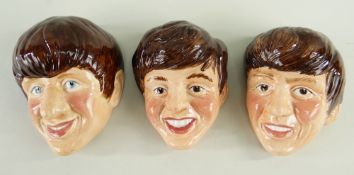 THREE KELSBORO WARE BEATLES WALL MASKS, c. 1964, depicting Paul, George and Ringo, impressed
