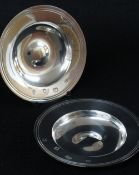 PAIR OF ELIZABETH II SILVER ALMS OR 'ARMADA' DISHES, circular, London, 1965 / 66 (2)