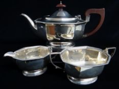 GEORGE V SILVER THREE-PIECE TEA SET, Ollivant & Botsford, Birmingham 1934, of paneled oval form with