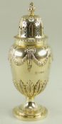 EDWARD VII SILVER GILT CASTER, George Nathan & Ridley Hayes, Chester 1909, having bow and swag