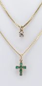 TWO YELLOW GOLD PENDANTS ON CHAINS comprising emerald crucifix on chain stamped '750', together with