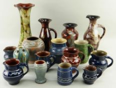 ASSORTED EWENNY POTTERY, jugs and vases, some with slip decoration and titled 'Llaeth' and three