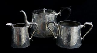 VICTORIAN SILVER THREE-PIECE TEA SET, P. Ashberry & Sons, Sheffield 1894, oval form with engraved