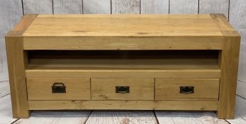 ULTRA-MODERN LIGHT OAK ENTERTAINMENT STAND with central open shelf and three lower drawers, on