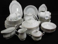 MODERN WHITE GILT RIMMED TEA & DINNERWARE, forty plus pieces, stamped 'Chodziez'