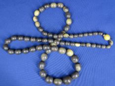 VINTAGE HORN BEAD NECKLACE - of 68 graduated beads, 23mm x 20mm the largest, 56cms L