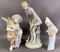 LLADRO - child hugging a mule, model J-24M, 21cms H, a young lady playing golf, model 1-2S, 28cms