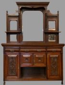 CIRCA 1920s MIRROR BACK SIDEBOARD with multiple bevelled glass mirror top, three drawers to the base