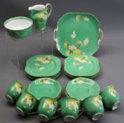 NORITAKE 21 PIECE TEASET - having floral decoration on green ground