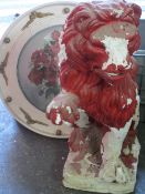 PLASTERWORK MODEL OF A SEATED LION, part painted red, 60cms H and a circular framed painting - Still