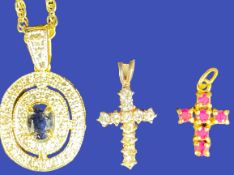 A TINY GOLD CRUCIFIX WITH PINK STONES - 1.1cms L, 1.2grms, a 9ct gold and cz encrusted crucifix, 1.