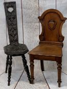 ANTIQUE MAHOGANY & OAK CHAIRS (2) - a mahogany shield back hall chair on turned front supports,