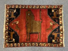 PERSIAN QASHQAI GABI HAND WOVEN IRANIAN RUG - red ground with central lion pattern and further