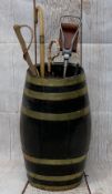 BRASS BANDED OAK BARREL STICKSTAND WITH CONTENTS - 61cms H, 35cms W