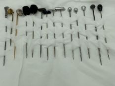 VICTORIAN & LATER TIE/STICKPINS - a collection to include an unmarked, but believed, gold example