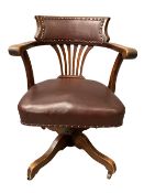 VINTAGE OAK OFFICE SWIVEL CHAIR on castors with rexine and studded seat, 88cms H, 56cms W, 46cms D