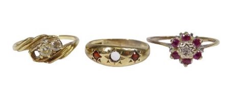 A 9CT GOLD CZ SET RING, 1.6grms, (one stone missing), a 9ct gold diamond and ruby floral set ring,